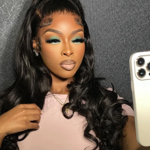 Black woman with make up. A brown lip liner and pale pink lipstick