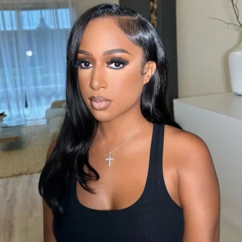 Black woman with make up. A brown lip liner and pale pink lipstick