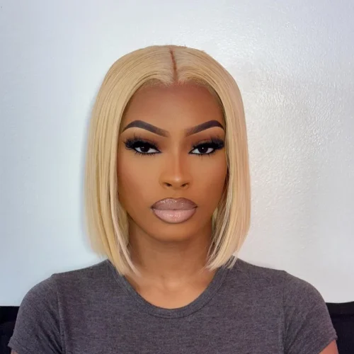 Black woman with make up. A brown lip liner and pale pink lipstick