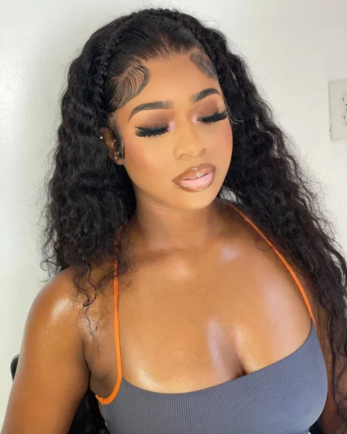 Black woman with make up. A brown lip liner and pale pink lipstick